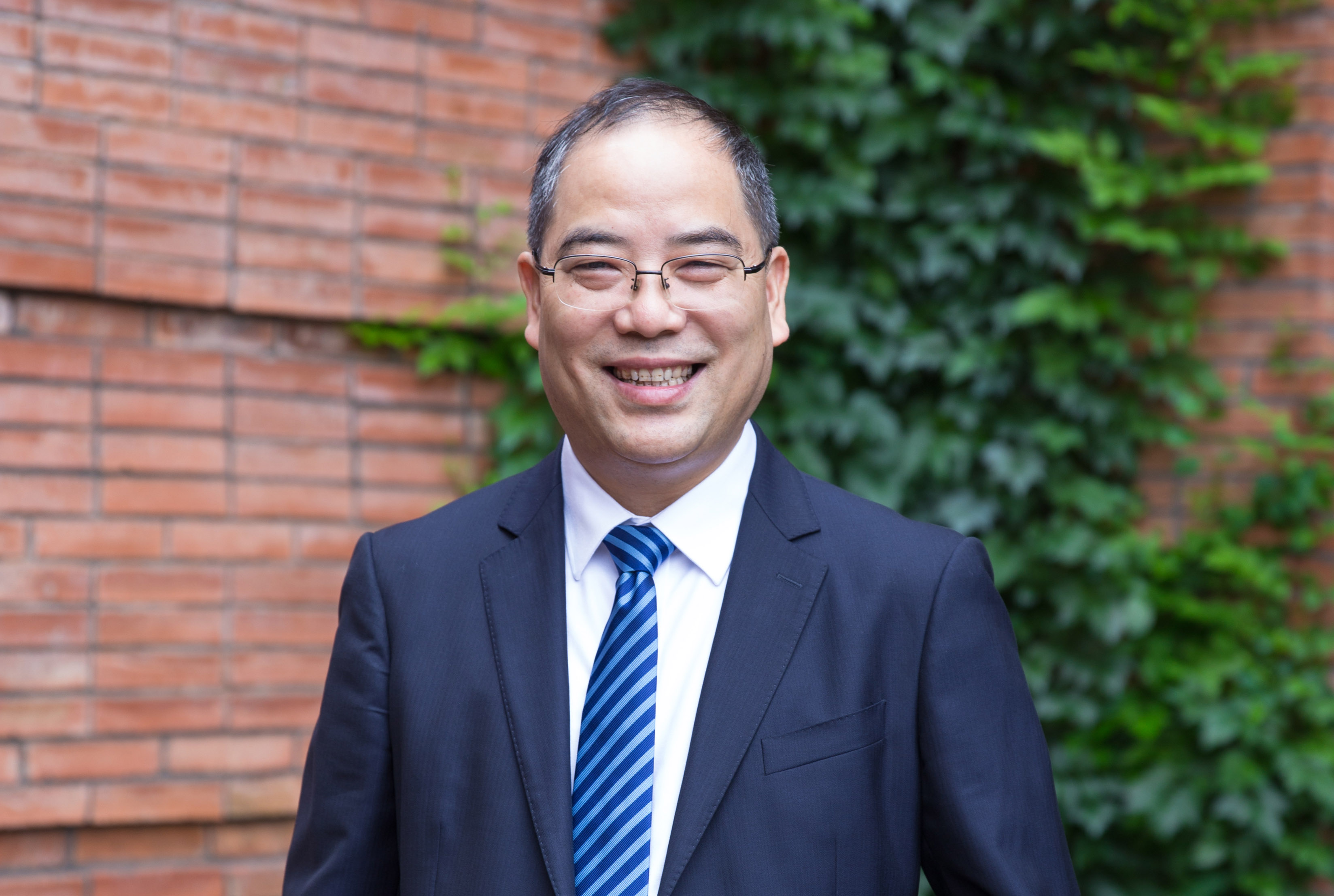 浙江工商大學黨委書記、教授 郁建興